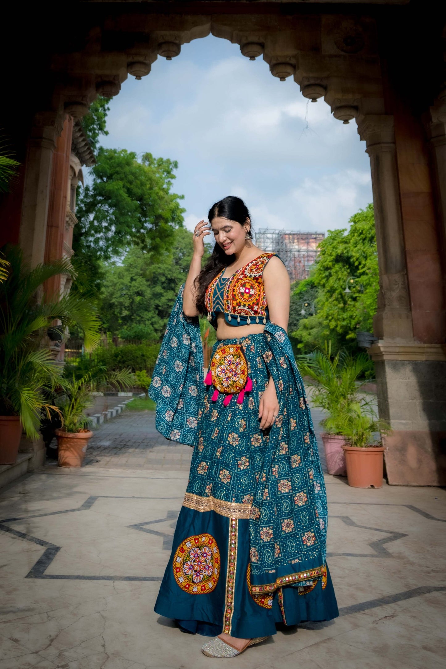 Navratri Special Teal Mirror Work Lehenga Choli Set with Kutchi Embroidery and Flared Skirt