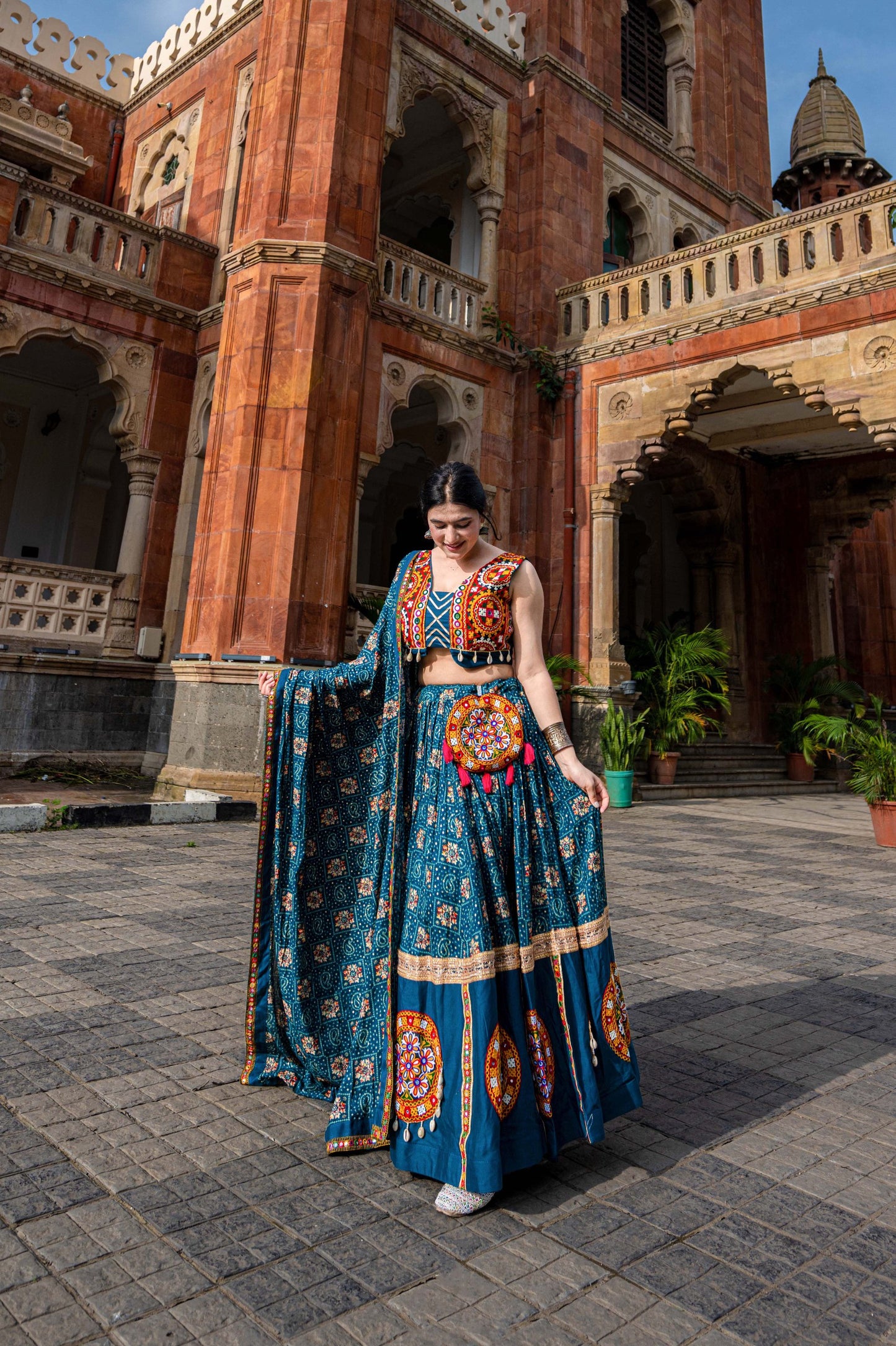 Navratri Special Teal Mirror Work Lehenga Choli Set with Kutchi Embroidery and Flared Skirt