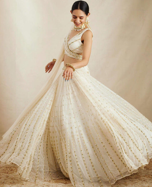 Elegant Off White Georgette Lehenga Choli with Sequined Border Dupatta