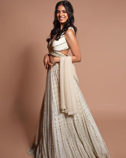 Elegant Off White Georgette Lehenga Choli with Sequined Border Dupatta