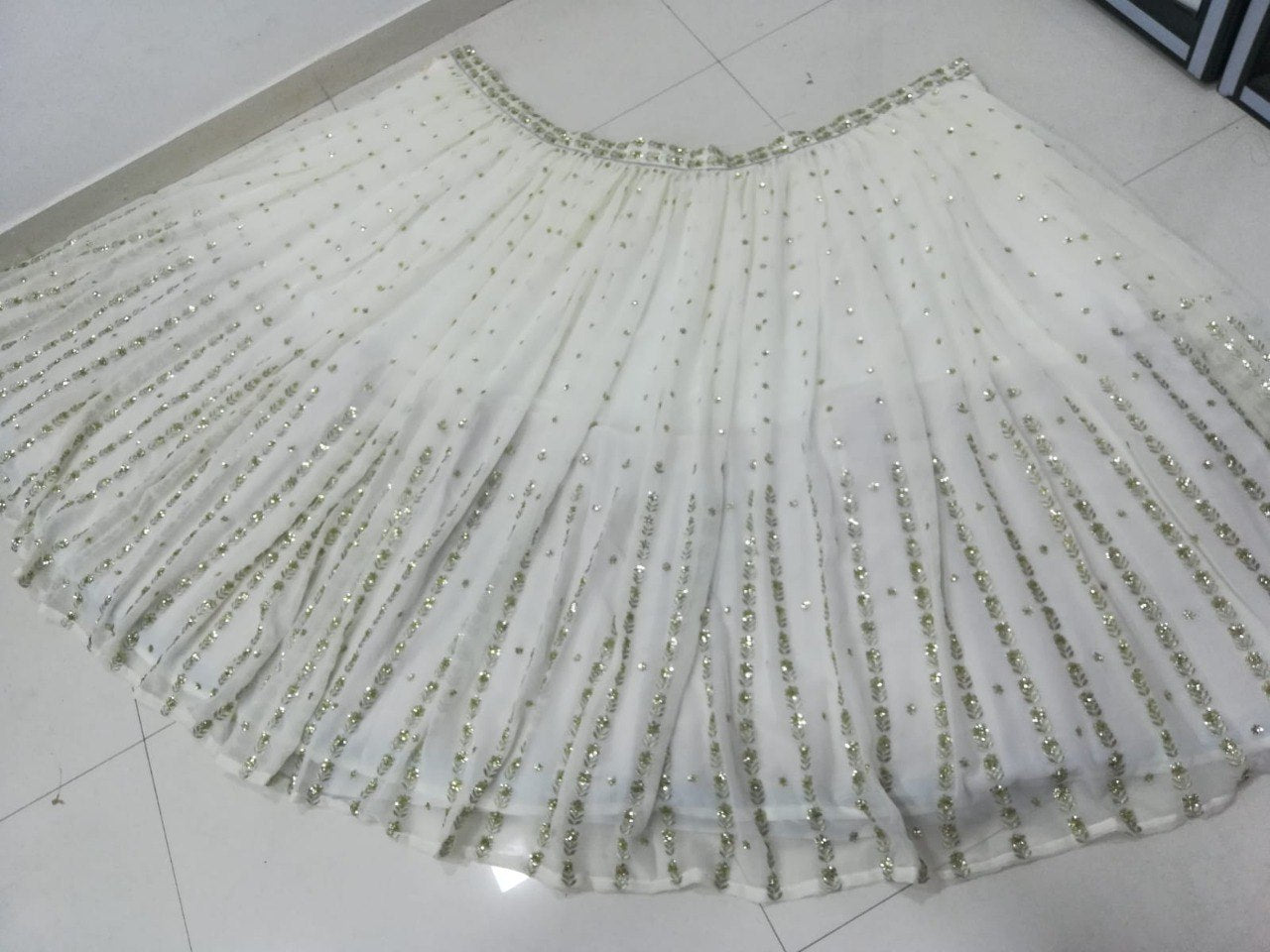 Elegant Off White Georgette Lehenga Choli with Sequined Border Dupatta