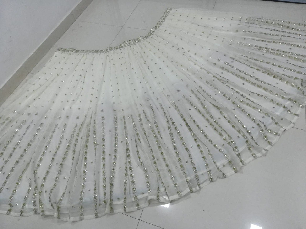 Elegant Off White Georgette Lehenga Choli with Sequined Border Dupatta