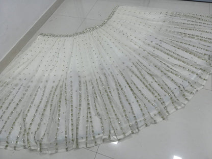 Elegant Off White Georgette Lehenga Choli with Sequined Border Dupatta