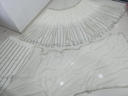 Elegant Off White Georgette Lehenga Choli with Sequined Border Dupatta