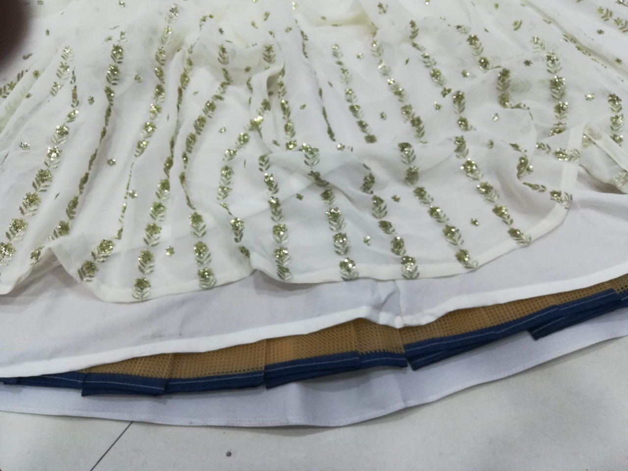 Elegant Off White Georgette Lehenga Choli with Sequined Border Dupatta