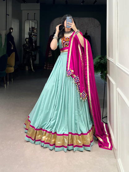 Sea Green Navaratri Chaniya Choli in Rayon With Gamathi and Embossed Lace