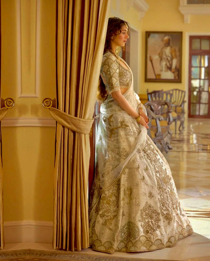 Elegant Ivory Slub Silk Lehenga Choli with Heavy Zari and Sequin Detailing