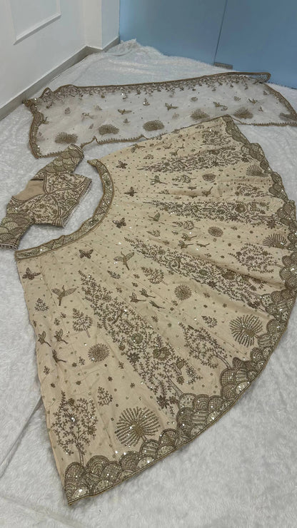 Elegant Ivory Slub Silk Lehenga Choli with Heavy Zari and Sequin Detailing