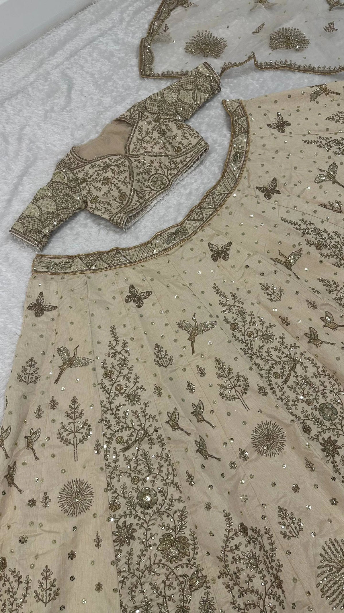 Elegant Ivory Slub Silk Lehenga Choli with Heavy Zari and Sequin Detailing