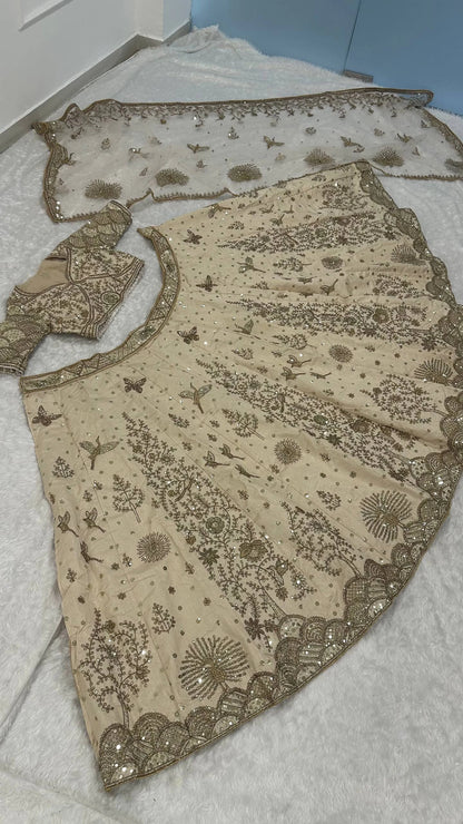 Elegant Ivory Slub Silk Lehenga Choli with Heavy Zari and Sequin Detailing