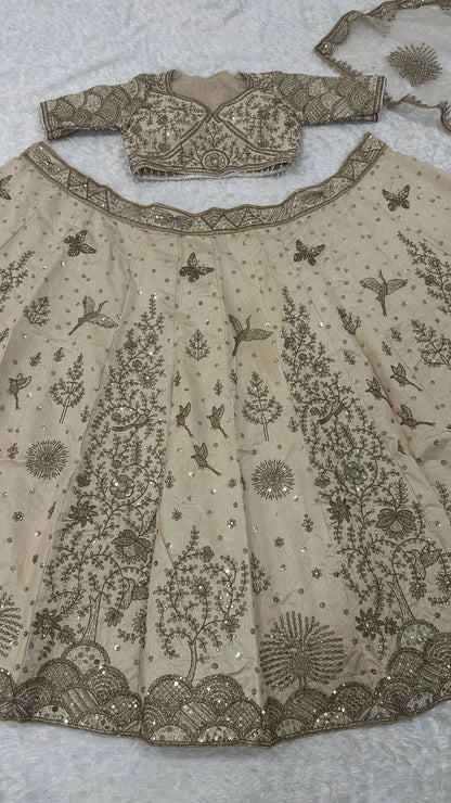 Elegant Ivory Slub Silk Lehenga Choli with Heavy Zari and Sequin Detailing