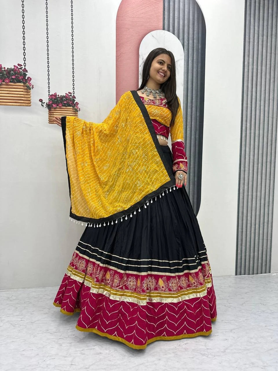 Traditional Garba Wear Black Lehenga Choli with Yellow Bandhani Dupatta for Women
