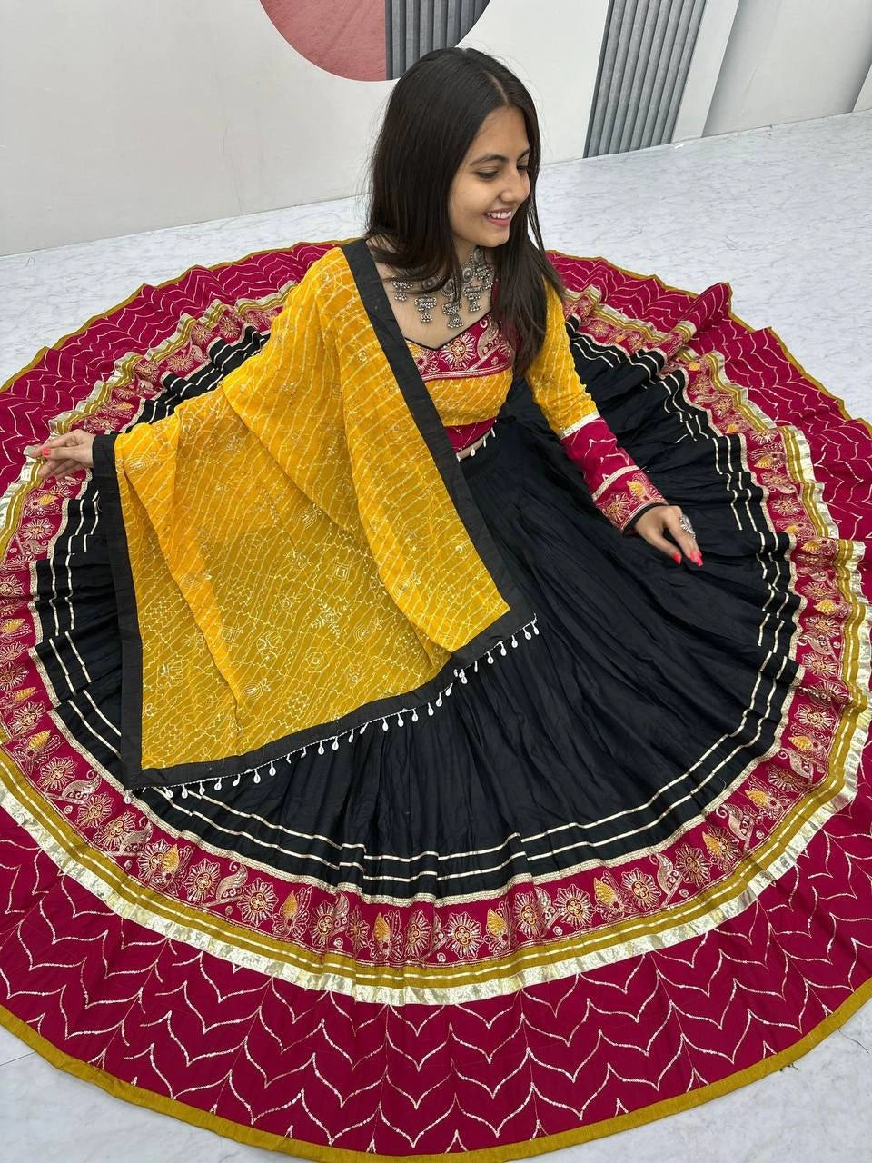 Traditional Garba Wear Black Lehenga Choli with Yellow Bandhani Dupatta for Women