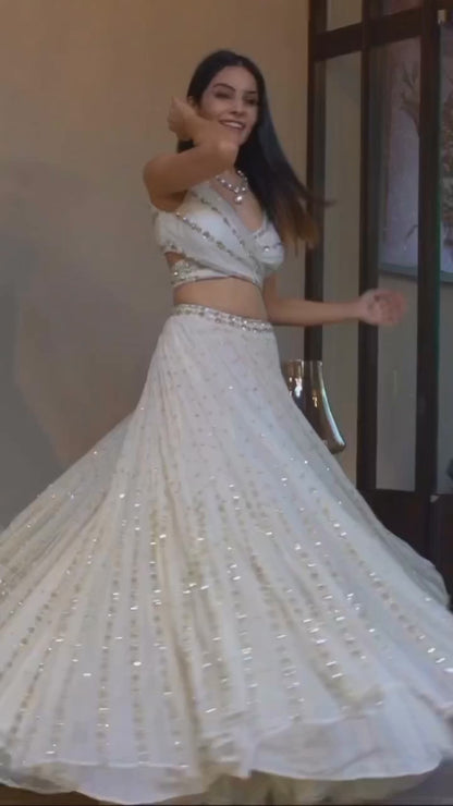 Elegant Off White Georgette Lehenga Choli with Sequined Border Dupatta